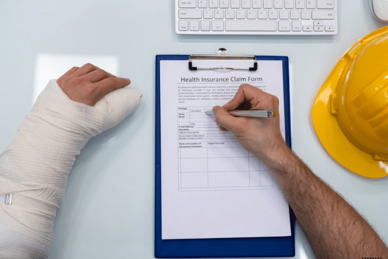 A injured worker filling a workers compensation form