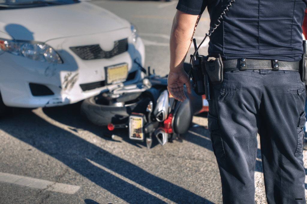 A policeman at an accident scene