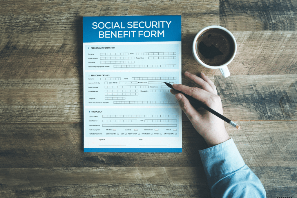 Someone filling social security benefit form